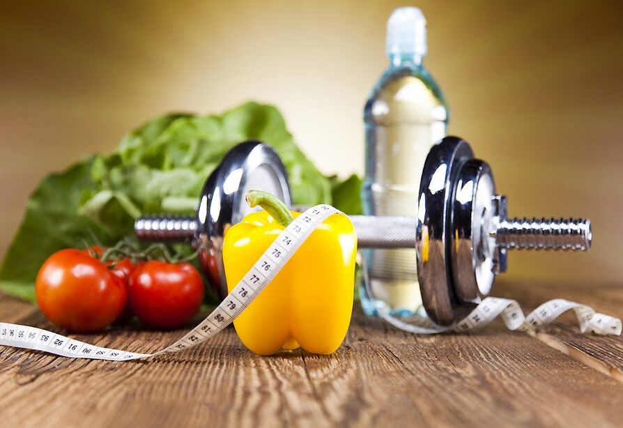 Dumbbell, λαχανικά και ταινία εκατοστών